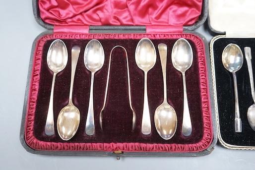 Two cased sets of six silver tea or coffee spoons including late Victorian with sugar tongs.